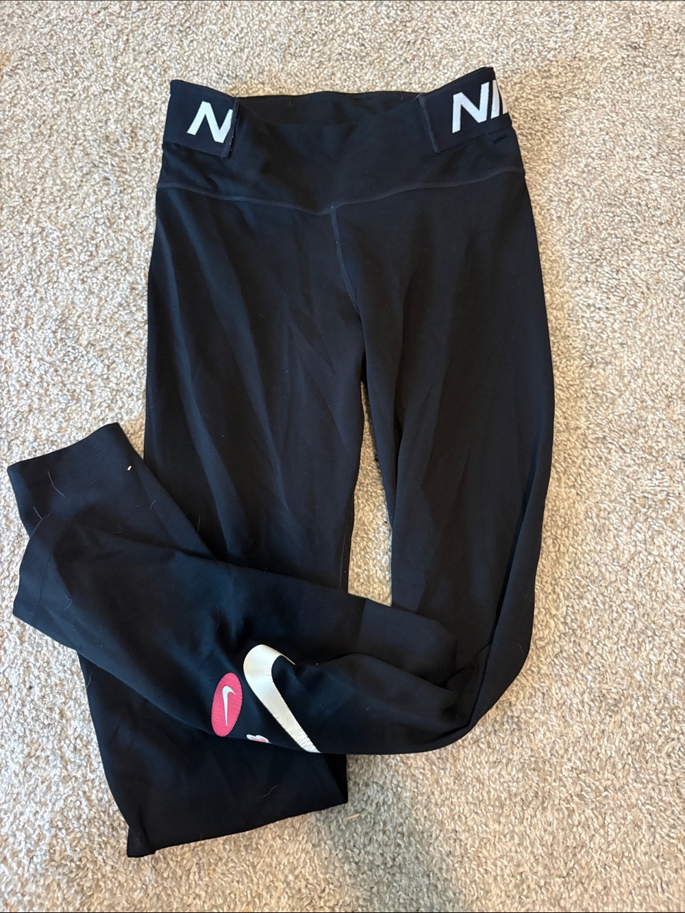 Nike Black Leggings with White Swoosh and Pink Accent